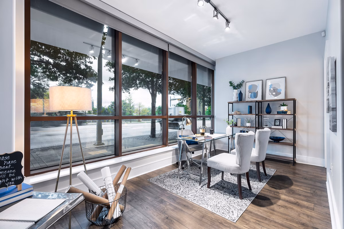 Elegant clubhouse with modern furnishings at Ashton Austin Apartments, ideal for events and social gatherings in a luxury community setting